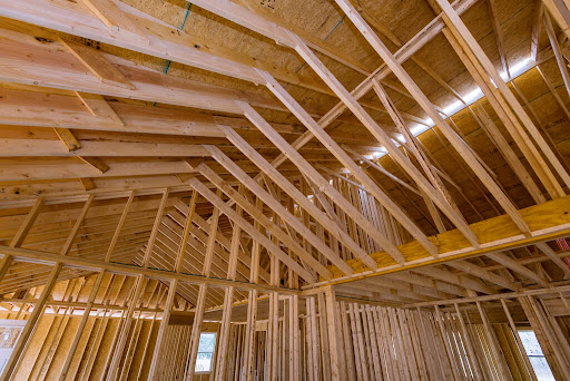 Framing for interior of truss beams frame system new house under construction